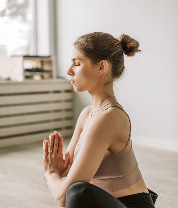 Focused man meditating after a workout session to represent mental clarity.